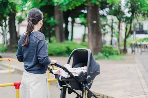 pushing baby stroller